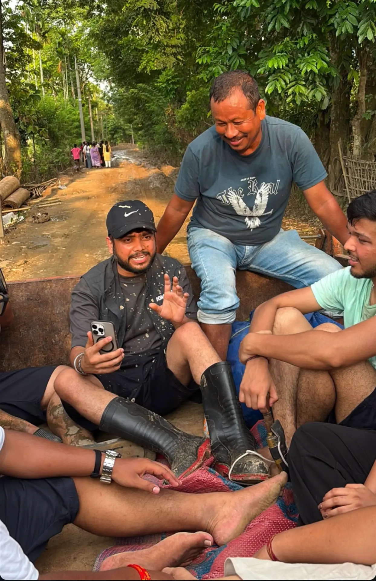 Donatekart founder Sarang Bobade speaking with community members on the ground in Assam